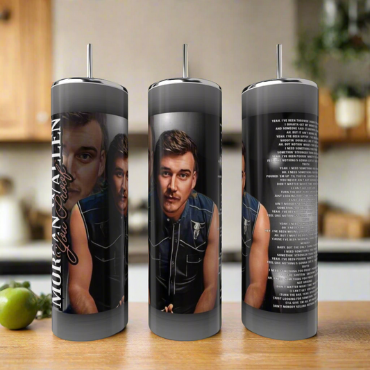 Three eco-friendly stainless steel Kreative Kreationz "You Proof Morgan Wallen" 20oz tumblers are shown on a kitchen counter, each featuring a photo of Morgan Wallen with short brown hair and a mustache; one displays song lyrics in white text.