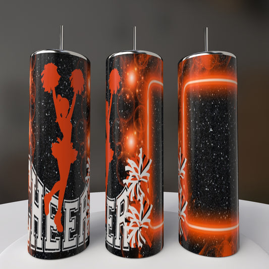 The Kreative Kreationz Cheer 20oz Tumbler features black, white, and orange cheerleader silhouettes with pom-poms, bold "CHEER" text, and glowing accents—ideal as a cheer mom gift.