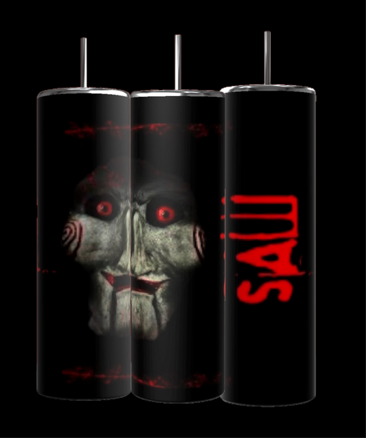 Three tall Kreative Kreationz SAW Puppet 20oz Tumblers in black stainless steel include metal straws and feature Billie the Puppet’s face, red eyes, and the red "SAW" logo. Enjoy eco-friendly drinkware inspired by the classic horror series.