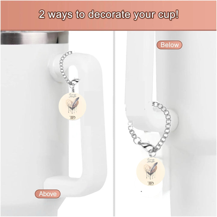 Two images show the Kreative Kreationz cup accessory, "I can do it with a broken heart | Charm Dangle," adorning a mug handle in varied positions. The handcrafted charm, circular with a chain and butterfly design, adds flair to your cup. Top text: "2 ways to decorate your cup!.