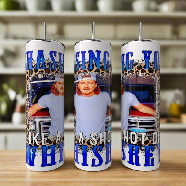 Three eco-friendly Morgan Wallen 20oz Tumblers by Kreative Kreationz feature a man with long hair and a cap by a truck, bold blue "Chasing you like a shot of whiskey" text, and include reusable straws.