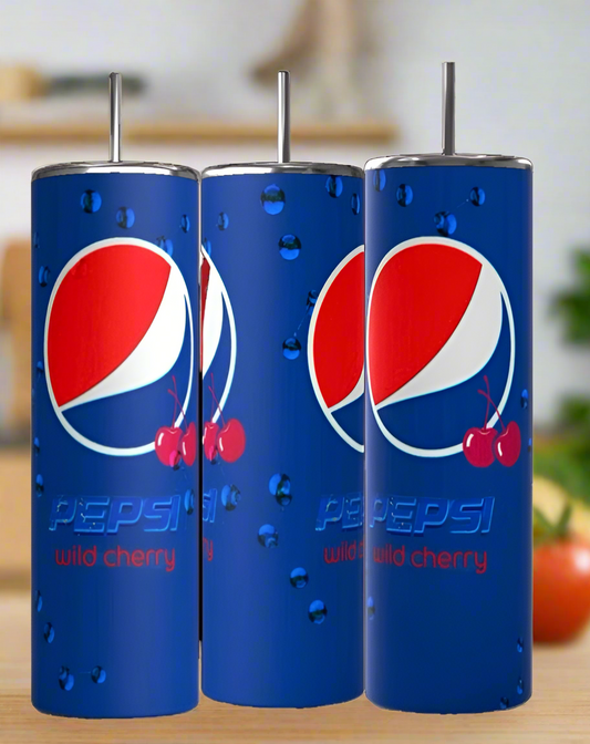 Kreative Kreationz Cherry Pepsi 20oz Tumblers, made from eco-friendly stainless steel, feature Wild Cherry logos, water droplets, and cherry art on blue. The three tall tumblers stand against a blurred kitchen background.