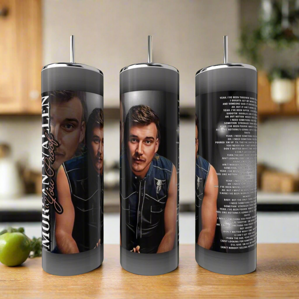Three eco-friendly stainless steel Kreative Kreationz "You Proof Morgan Wallen" 20oz tumblers are shown on a kitchen counter, each featuring a photo of Morgan Wallen with short brown hair and a mustache; one displays song lyrics in white text.