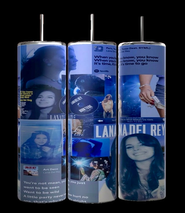 The Lana Del Ray 20oz tumbler by Kreative Kreationz shows a collage of images and text, including a smiling woman, song titles, music player interface, and lyrics snippets. Featuring a blue color scheme with white accents, it's perfect for any music lover's collection.