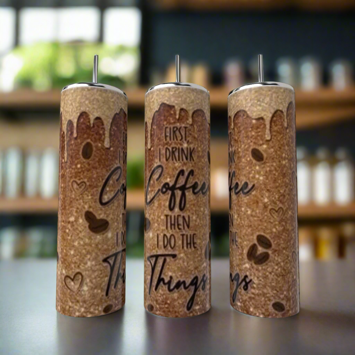 Three Kreative Kreationz “First I drink coffee then I do the things” 20oz tumblers with a coffee-themed design add stylish charm to your kitchen counter.