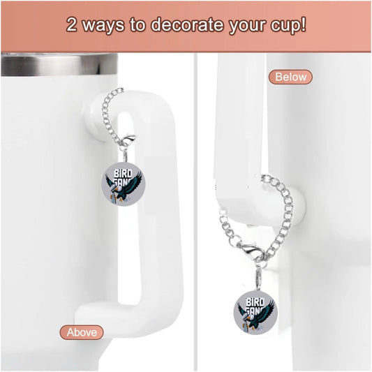 Showcasing the Eagles Bird Gang Charm Dangle by Kreative Kreationz: a white cup with a “BIRD GANG” pendant charm attached in two ways to the handle, above and below. Text reads, “2 ways to decorate your cup!”.