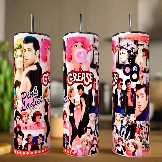 Kreative Kreationz's  -80s set includes three luxury tumblers with vibrant collage designs featured against a blurred indoor backdrop.