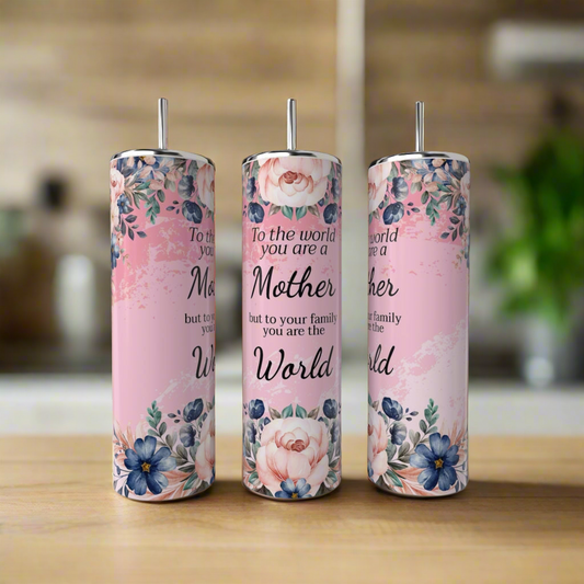 Three Kreative Kreationz Mom 20oz Tumblers, each pink with floral design and metal straw, feature the message: "To the world you are a mother, but to your family you are the world," displayed on a kitchen counter.