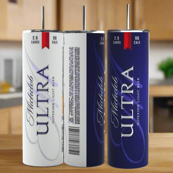 Three Michelob ULTRA light beer cans sit on a kitchen counter, showing front, side, and back views. Pair your beer with the Kreative Kreationz Michelob Ultra 20oz Stainless Steel Tumbler for the perfect sip.