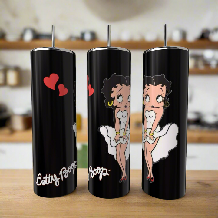 Three Kreative Kreationz Betty B White 20oz Skinny Tumblers with straws, featuring cartoon character Betty Boop in a white dress with red hearts and her signature, are shown on a wooden kitchen countertop.