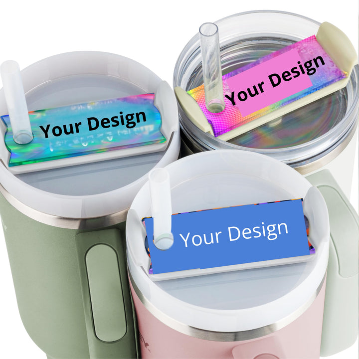 Kreative Kreationz's Customized Stanley lid Toppers are available in pink, green, and clear tumblers. Each features a "Your Design" area with multicolored, holographic, or blue backgrounds plus a custom straw.