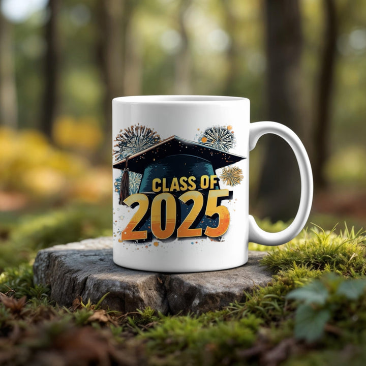 The Kreative Kreationz Class of 2025 Graduate Mug, adorned with a graduation cap, fireworks, and "Class of 2025," is the perfect gift to celebrate new beginnings.